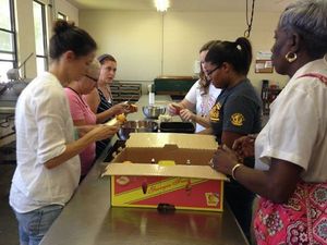 300x225 Coring peaches, in Canning corn and peaches at Lowndes High School, by Gretchen Quarterman, for OkraParadiseFarms.com, 12 July 2014