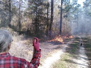 Gretchen with fire at the driveway