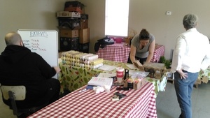 Cory Danner signing in popcorn from Gretchen Quarterman, Okra Paradise Farms