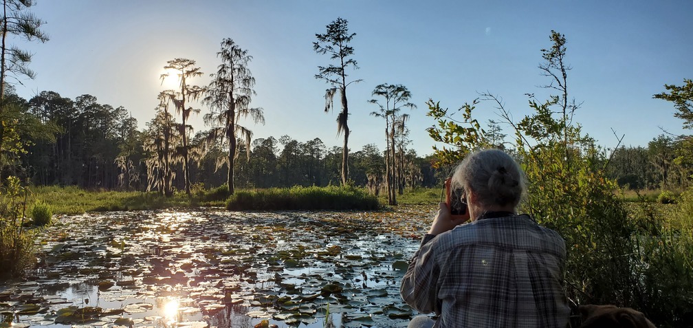 Gretchen at the pond at sunset