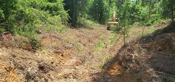 [Movie: Digging backhoe]